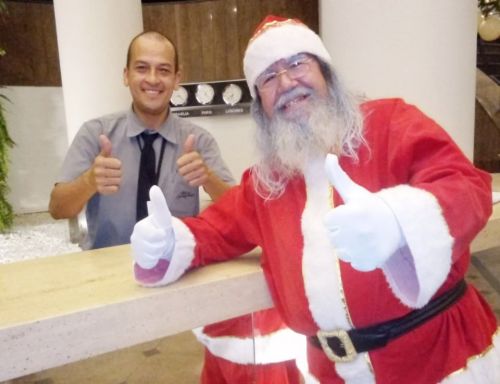 aluguel de papai noel para visitas e entrega dos presentes  730258